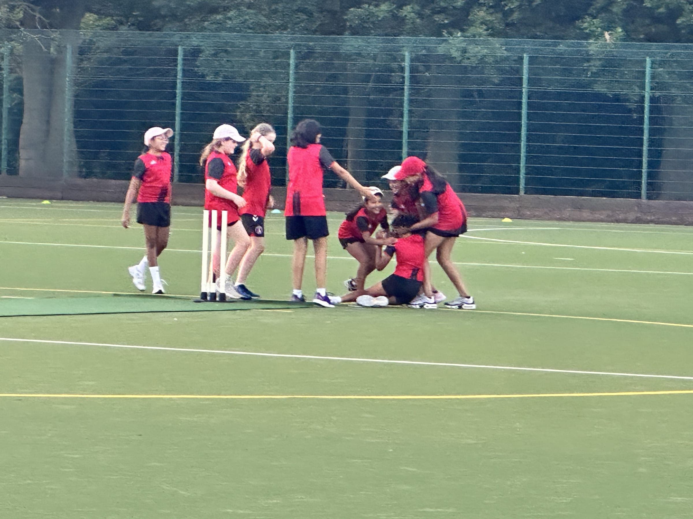 Girls’ team celebrating a wicket at Cricket Carnival 2026